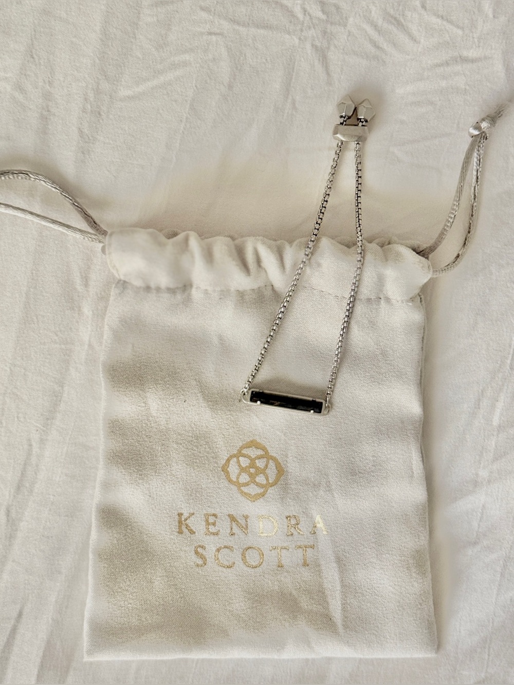 Kendra Scott Silver Bracelet with Sleek Black Bar Pendant